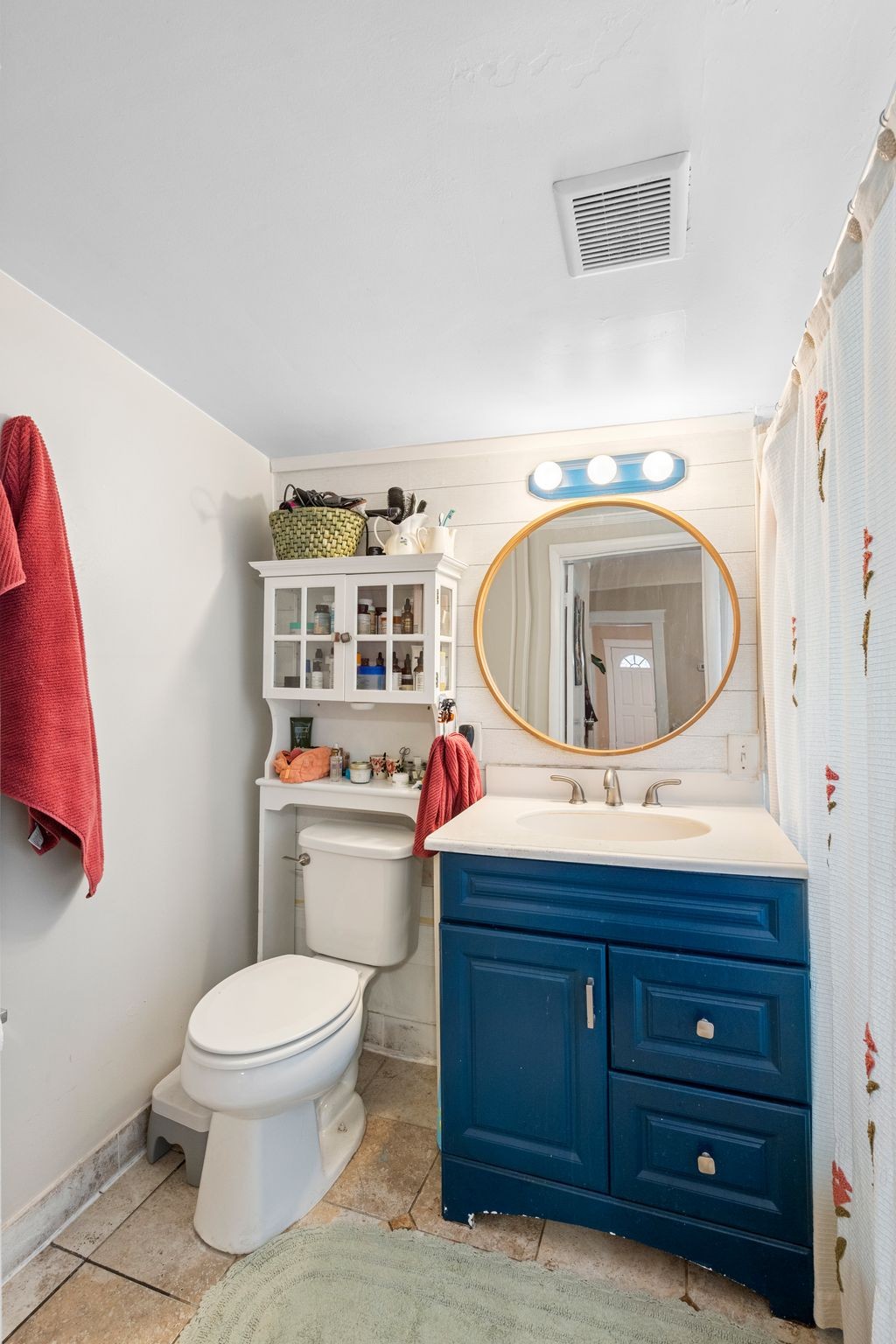 1712 County Hospital Road Nashville, TN 37218 - Photo 21 of 31 a bathroom with a sink a toilet and a mirror