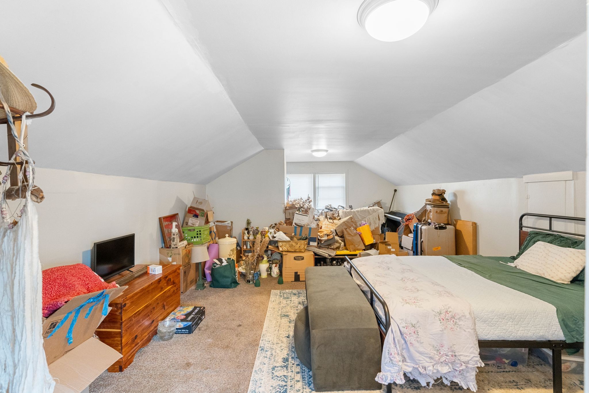 1712 County Hospital Road Nashville, TN 37218 - Photo 23 of 31 a bed room with a bed and a chair