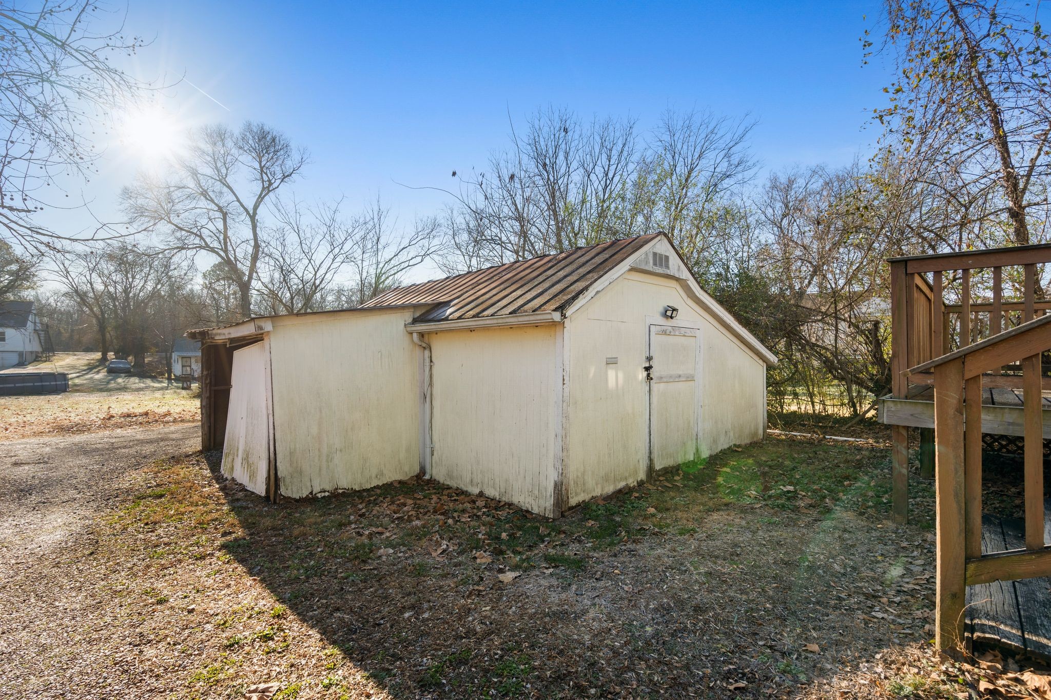 1712 County Hospital Road Nashville, TN 37218 - Photo 27 of 31 a view of a house with a yard covered in snow