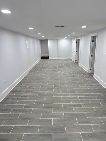 a view of hallway with a window