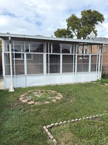 a house view with a garden space