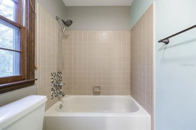 a bathroom with a bathtub