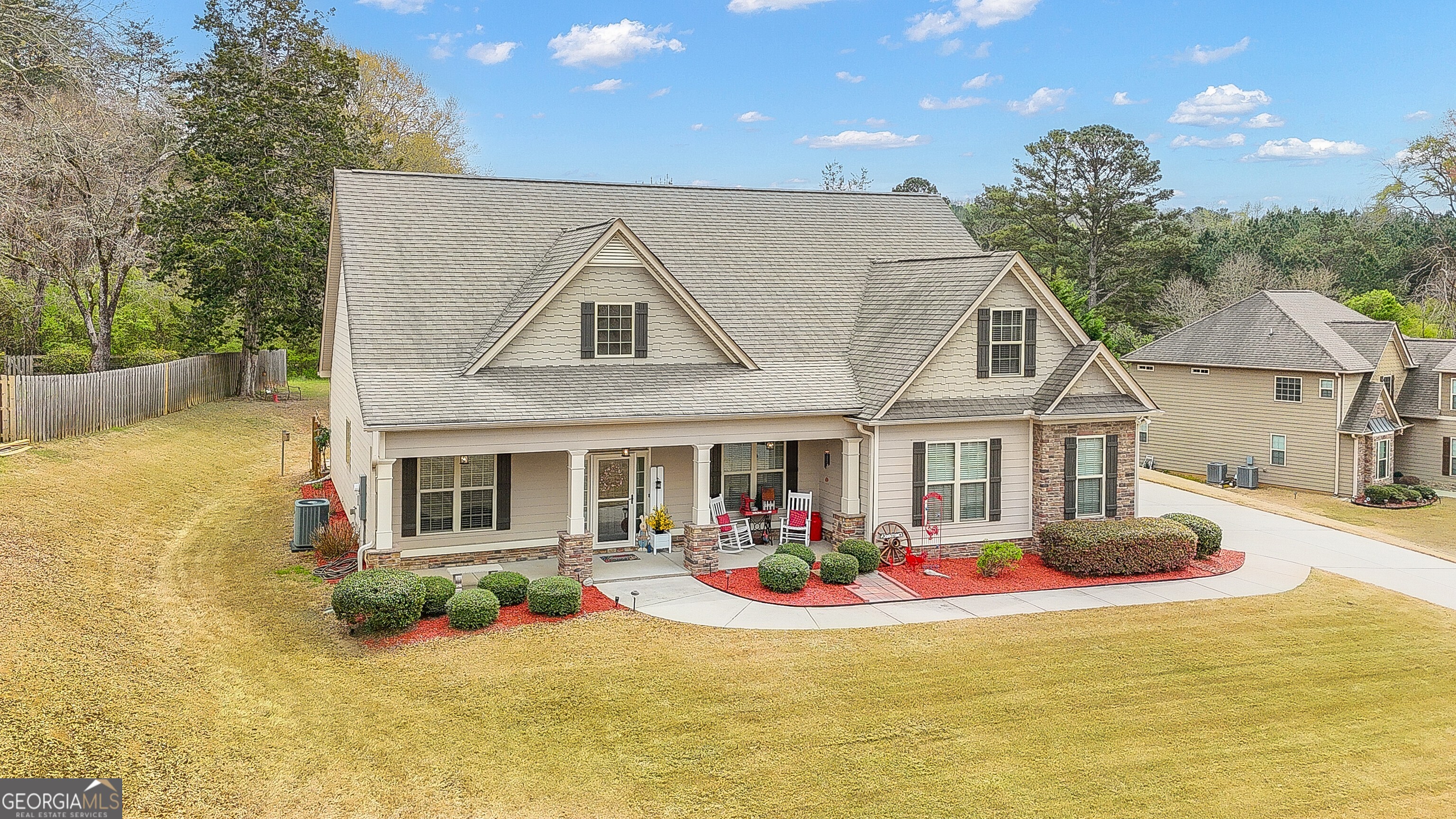 32 Austin Storey Circle Newnan, GA 30263 - Photo 82 of 84 a front view of a house with yard swimming pool and outdoor seating