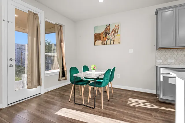 a kitchen that has a sink and a stove