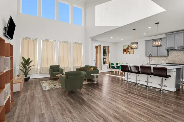 a living room with furniture and a table