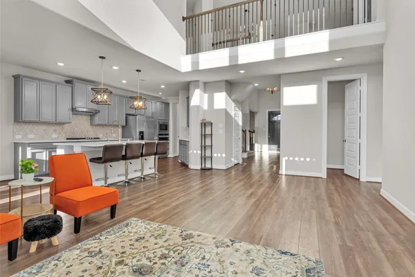 a living room with furniture and a table