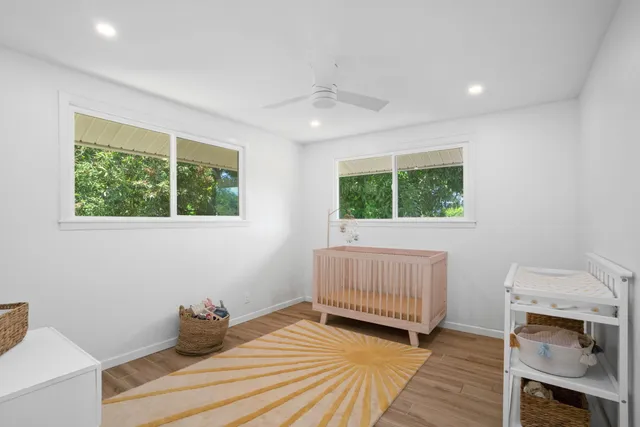 a room with a bed and a window