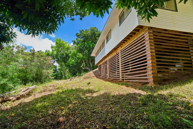 a backyard of a house with lots of green space