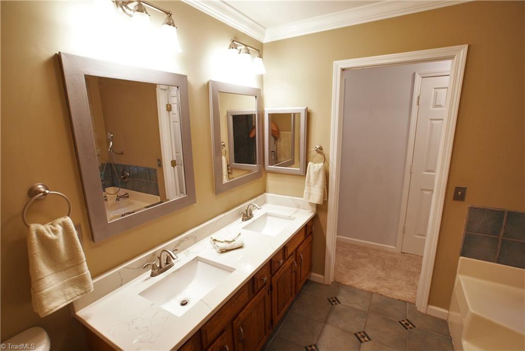 3212 Derby Circle High Point, NC 27265 - Photo 21 of 30 Master Bath - custom shelves behind large mirrors.