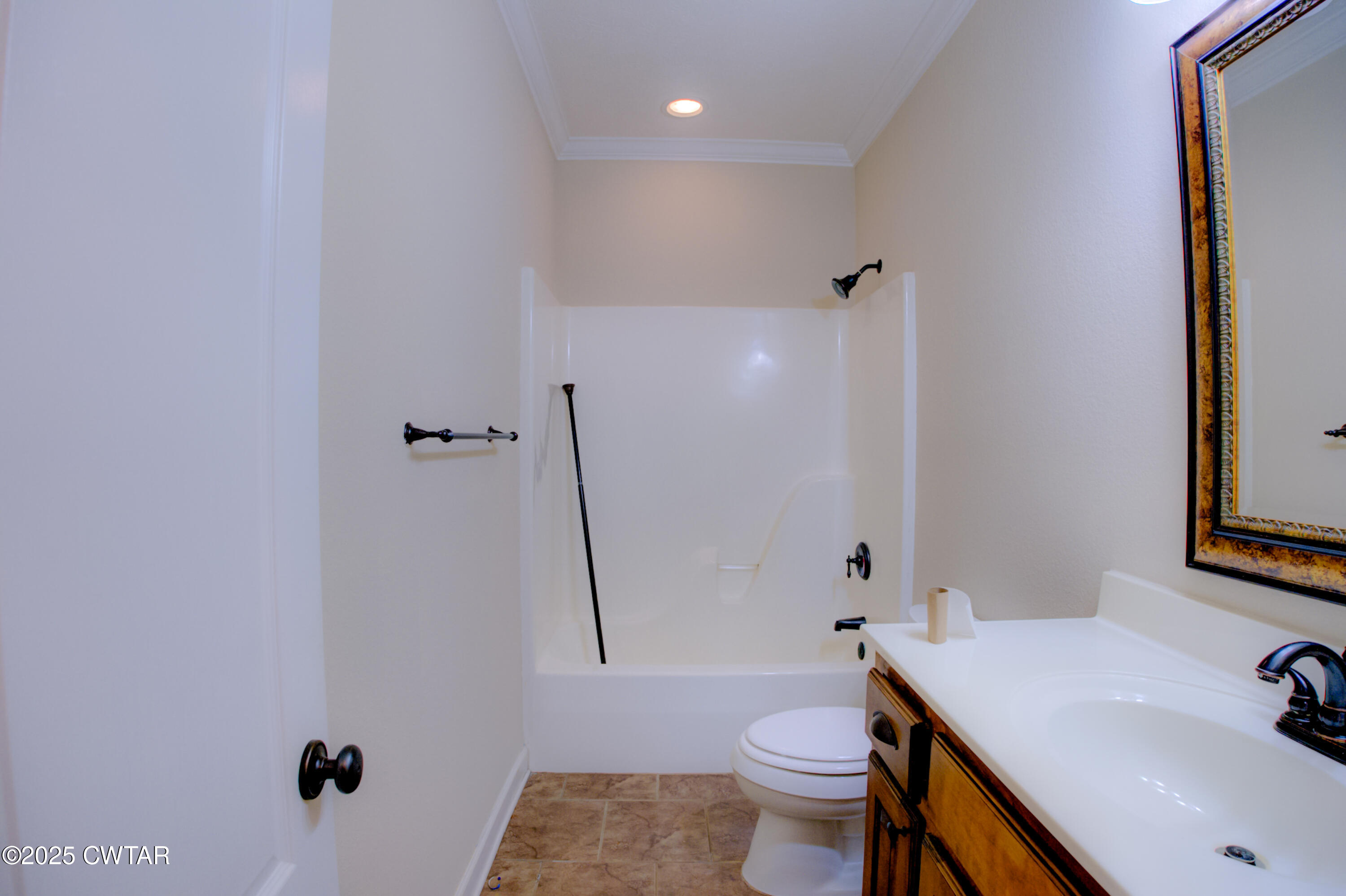 135 Fox Run Cove Henderson, TN 38340 - Photo 15 of 21 a bathroom with a sink toilet and shower