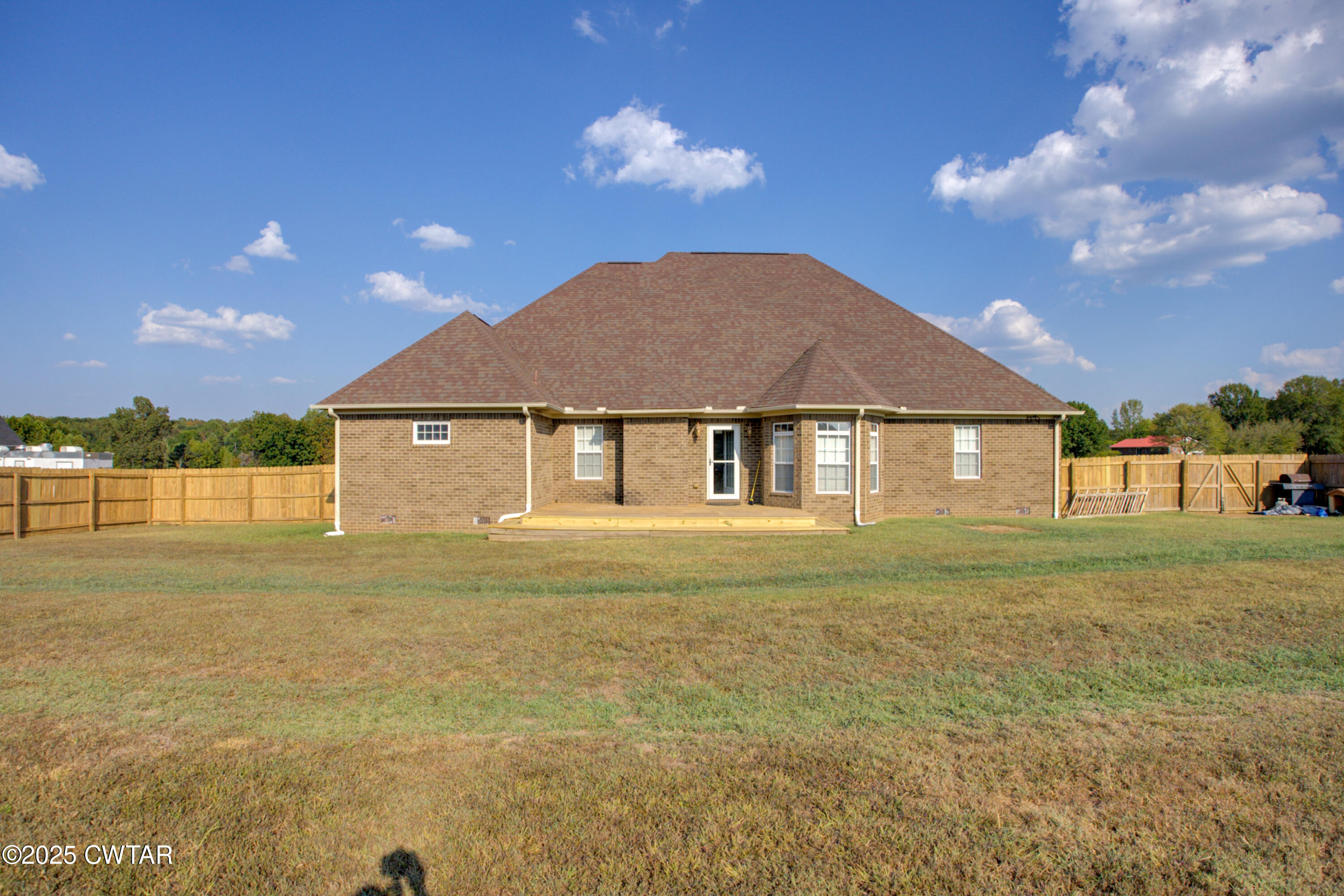 135 Fox Run Cove Henderson, TN 38340 - Photo 20 of 21 a front view of a house with a yard