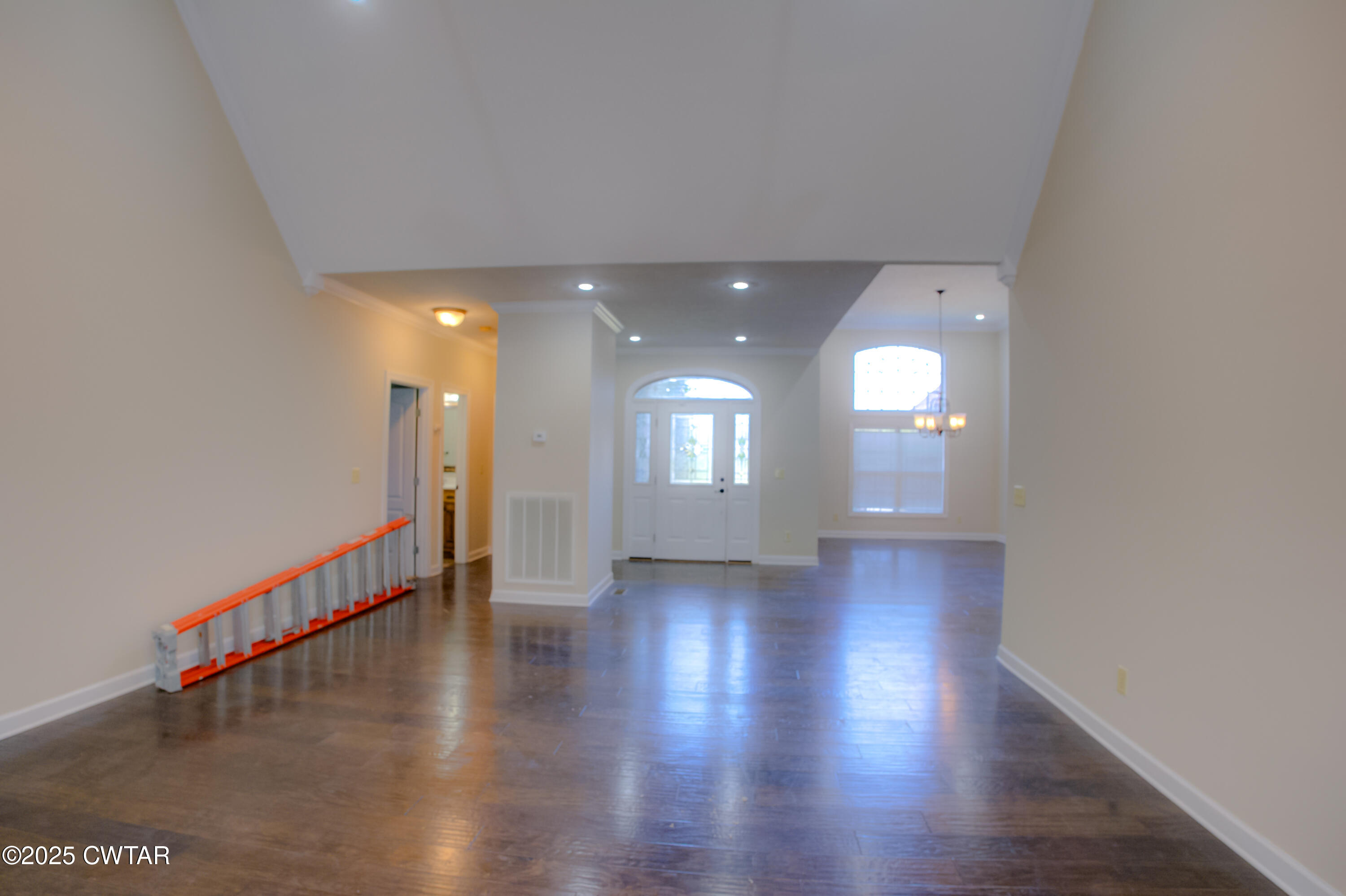 135 Fox Run Cove Henderson, TN 38340 - Photo 5 of 21 a view of a hallway with wooden floor