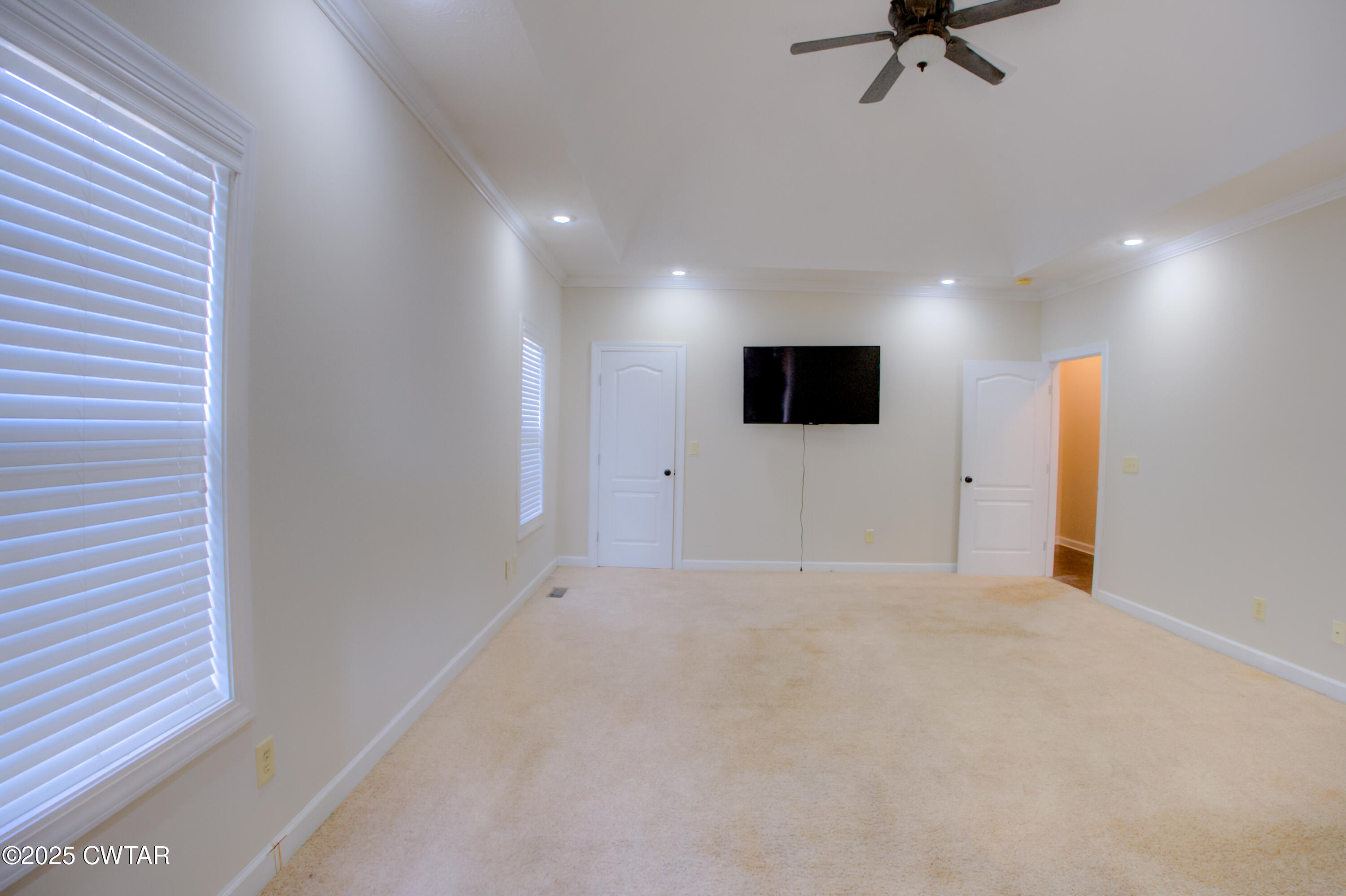 135 Fox Run Cove Henderson, TN 38340 - Photo 9 of 21 a view of a livingroom with a flat screen tv