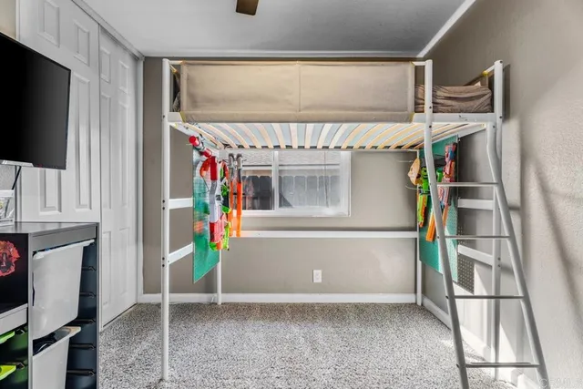 a bathroom with a sink a toilet a shower curtain and a bath tub