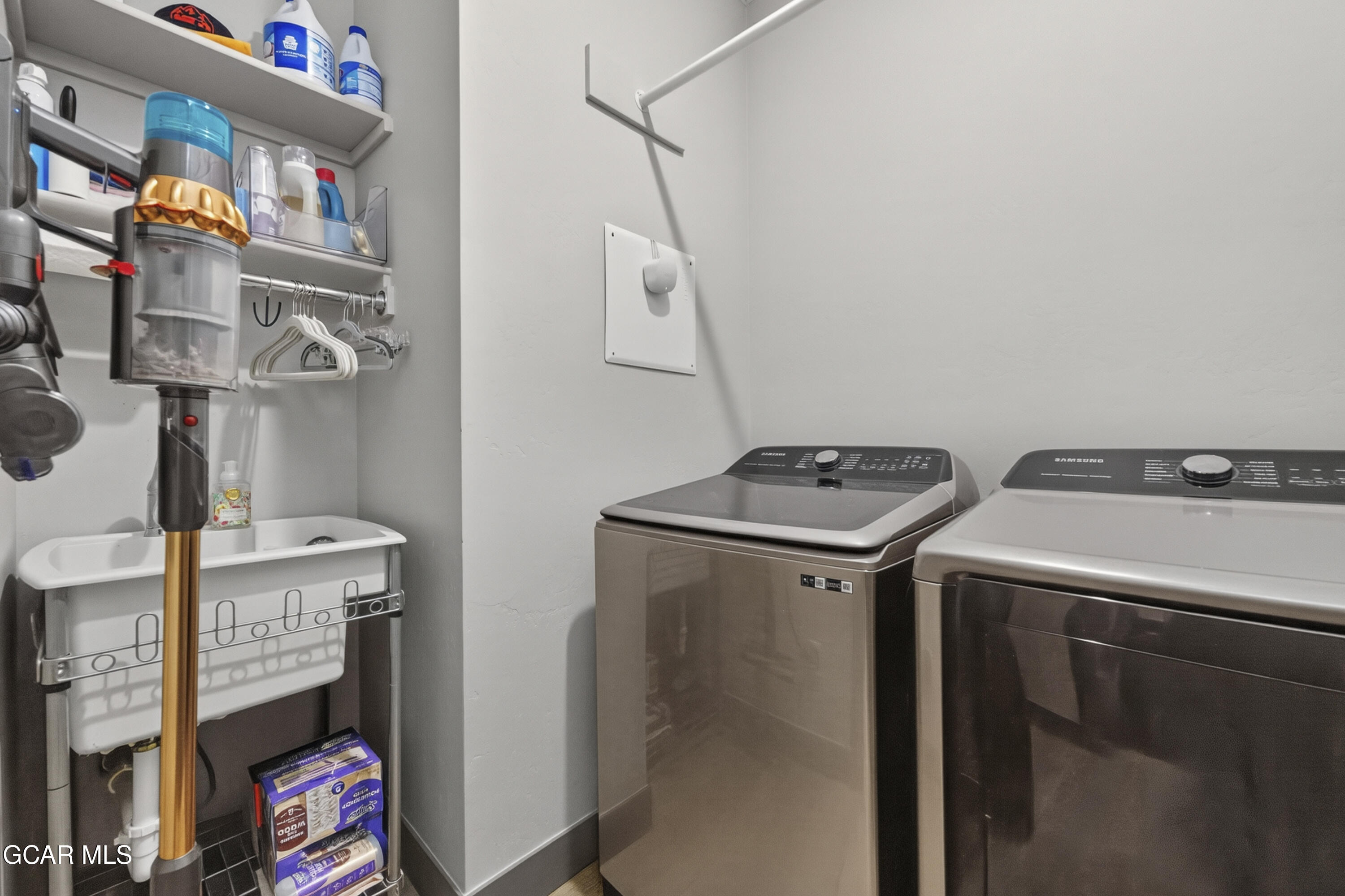 154 Eagle Ridge Drive Granby, CO 80446 - Photo 39 of 59 a utility room with dryer and washer