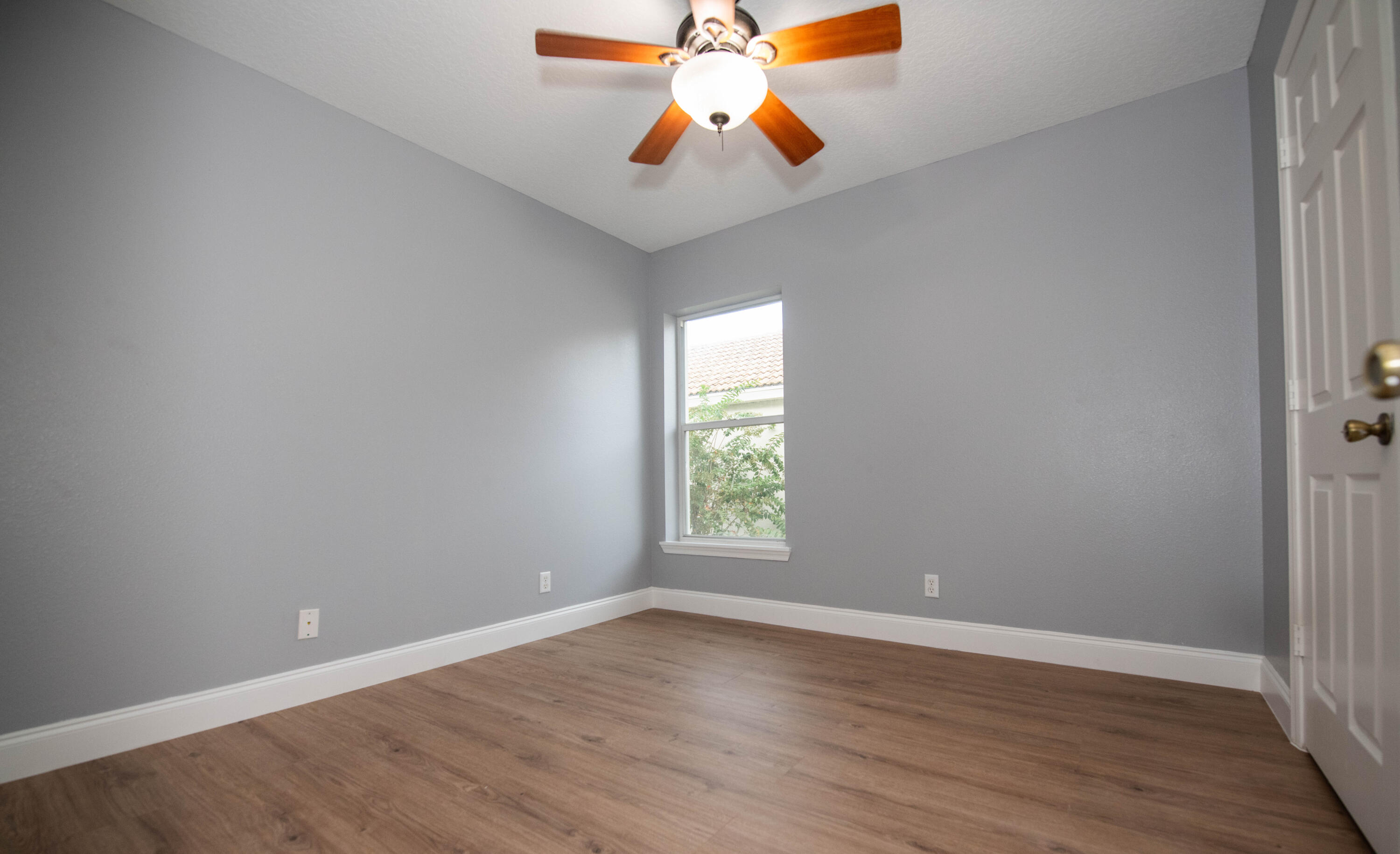 1101 Woodfield Road Greenacres, FL 33415 - Photo 18 of 24 Bedroom 2 with window view