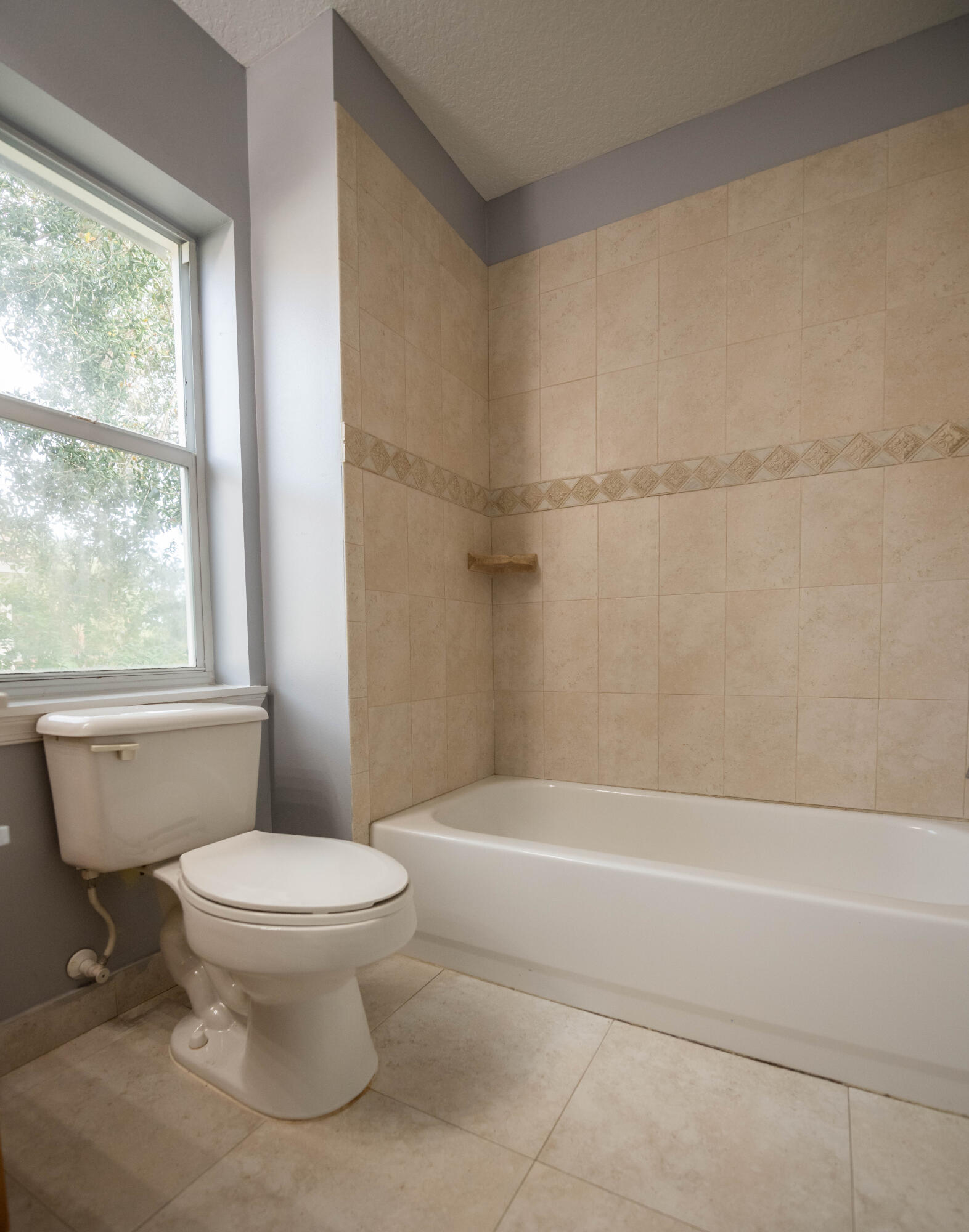 1101 Woodfield Road Greenacres, FL 33415 - Photo 20 of 24 Guest Bathroom 1