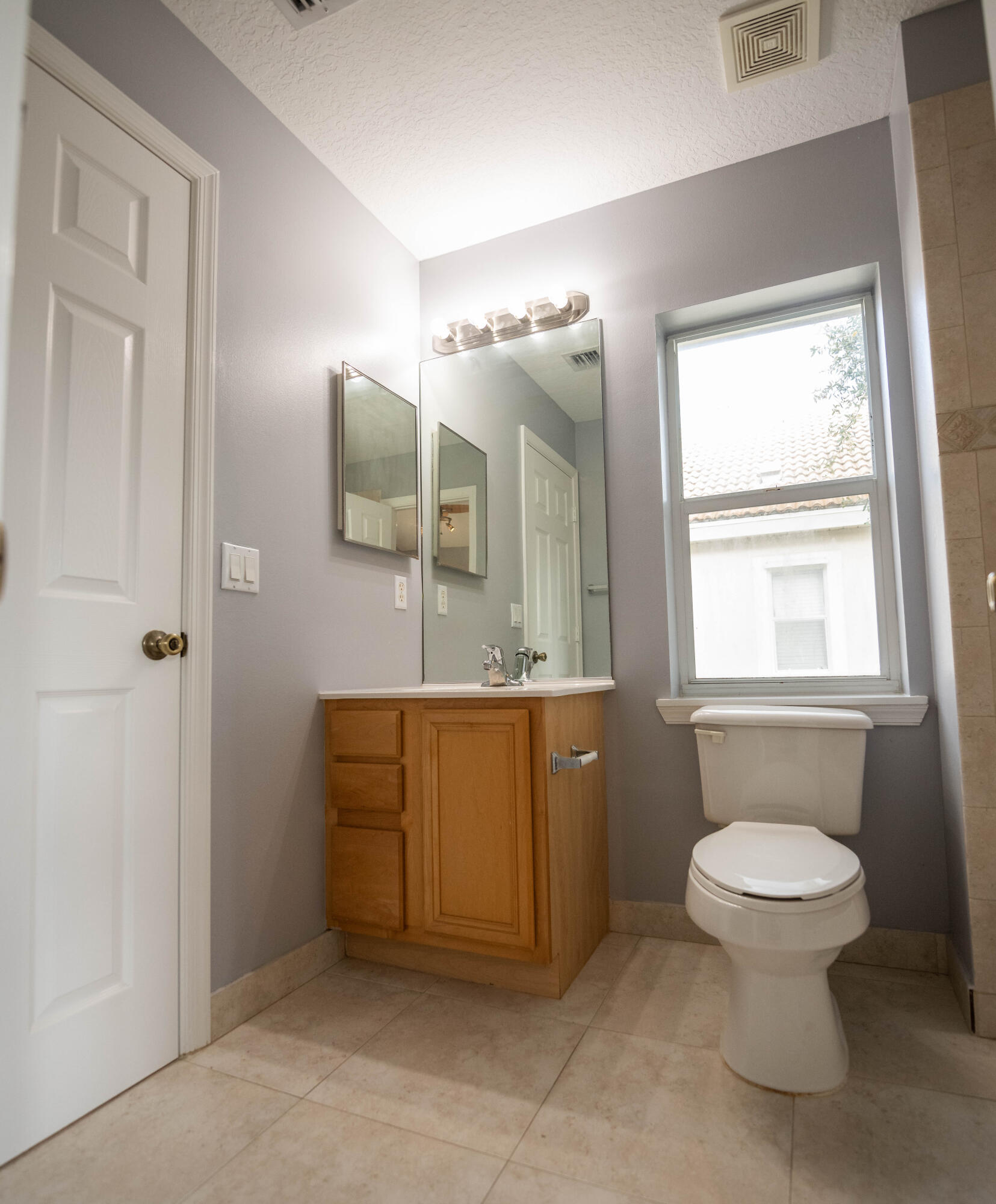 1101 Woodfield Road Greenacres, FL 33415 - Photo 21 of 24 Gust Bathroom 2