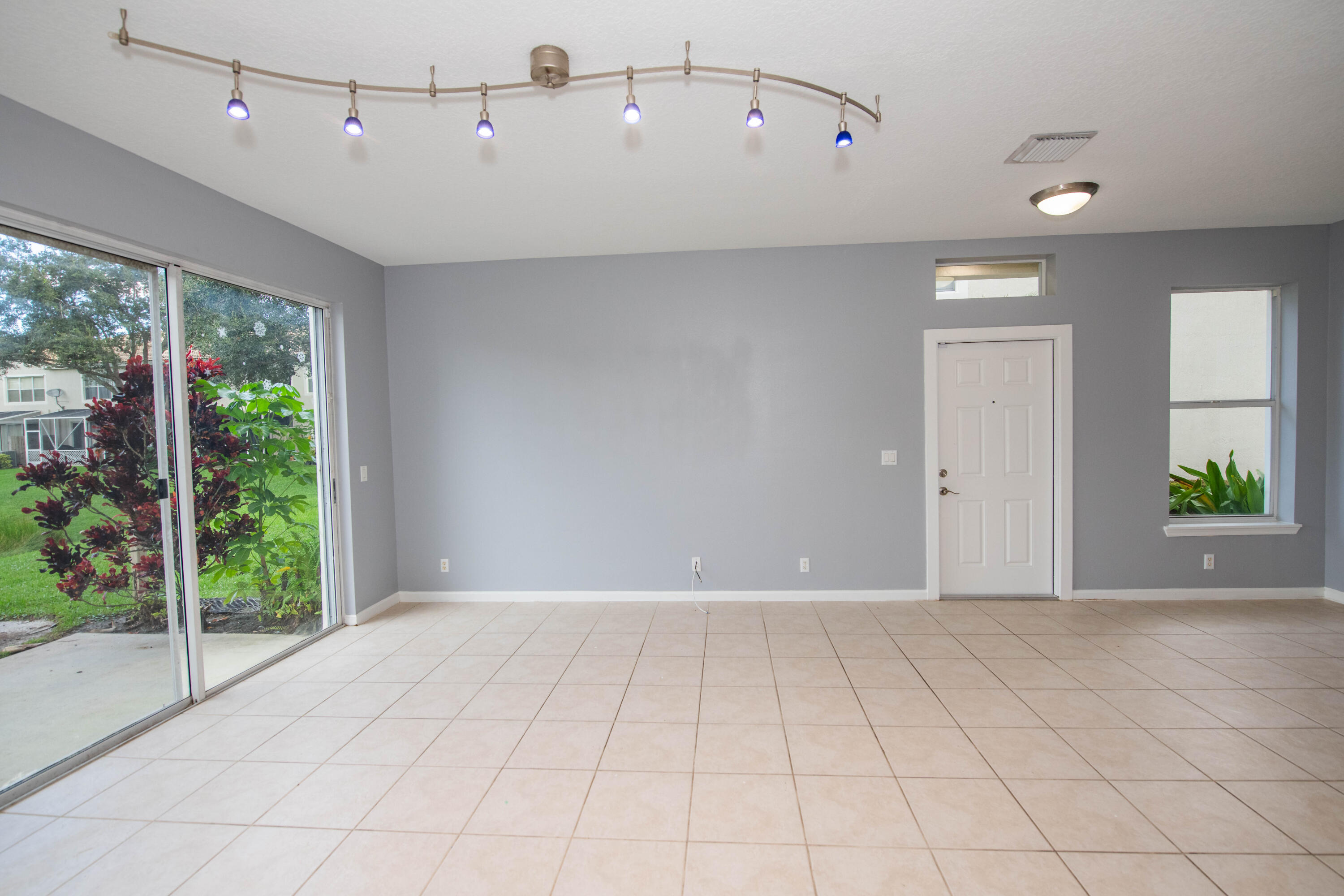 1101 Woodfield Road Greenacres, FL 33415 - Photo 4 of 24 Living Room 2