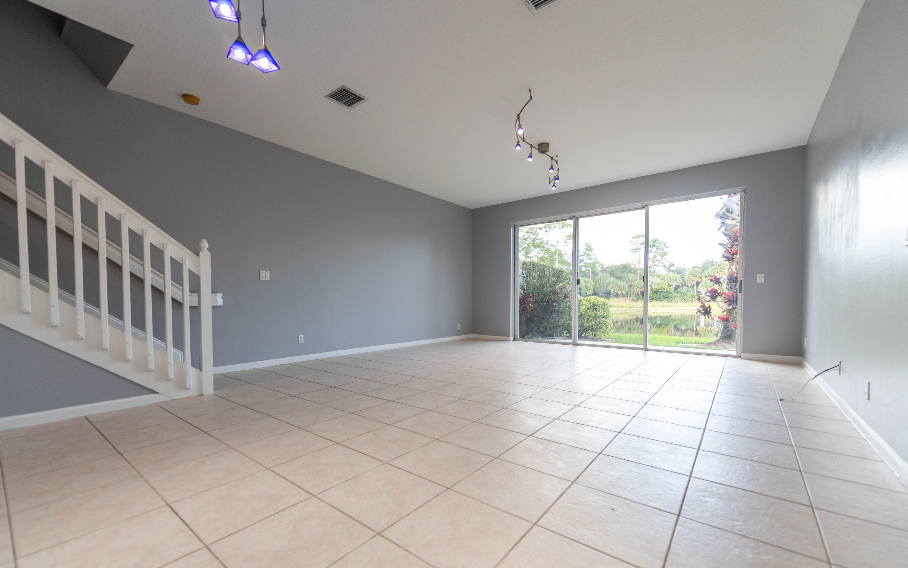 1101 Woodfield Road Greenacres, FL 33415 - Photo 5 of 24 Living Room 1