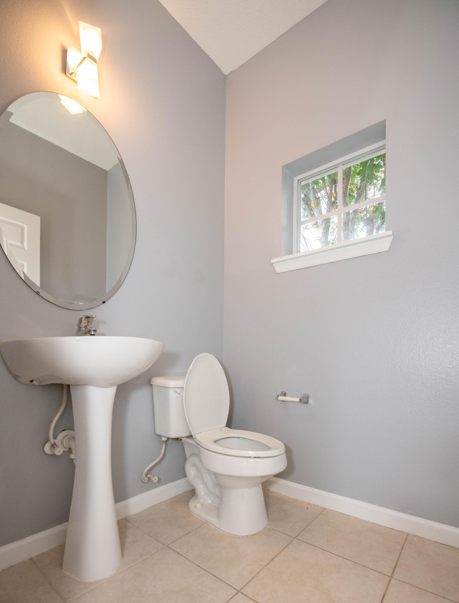 1101 Woodfield Road Greenacres, FL 33415 - Photo 9 of 24 Powder room