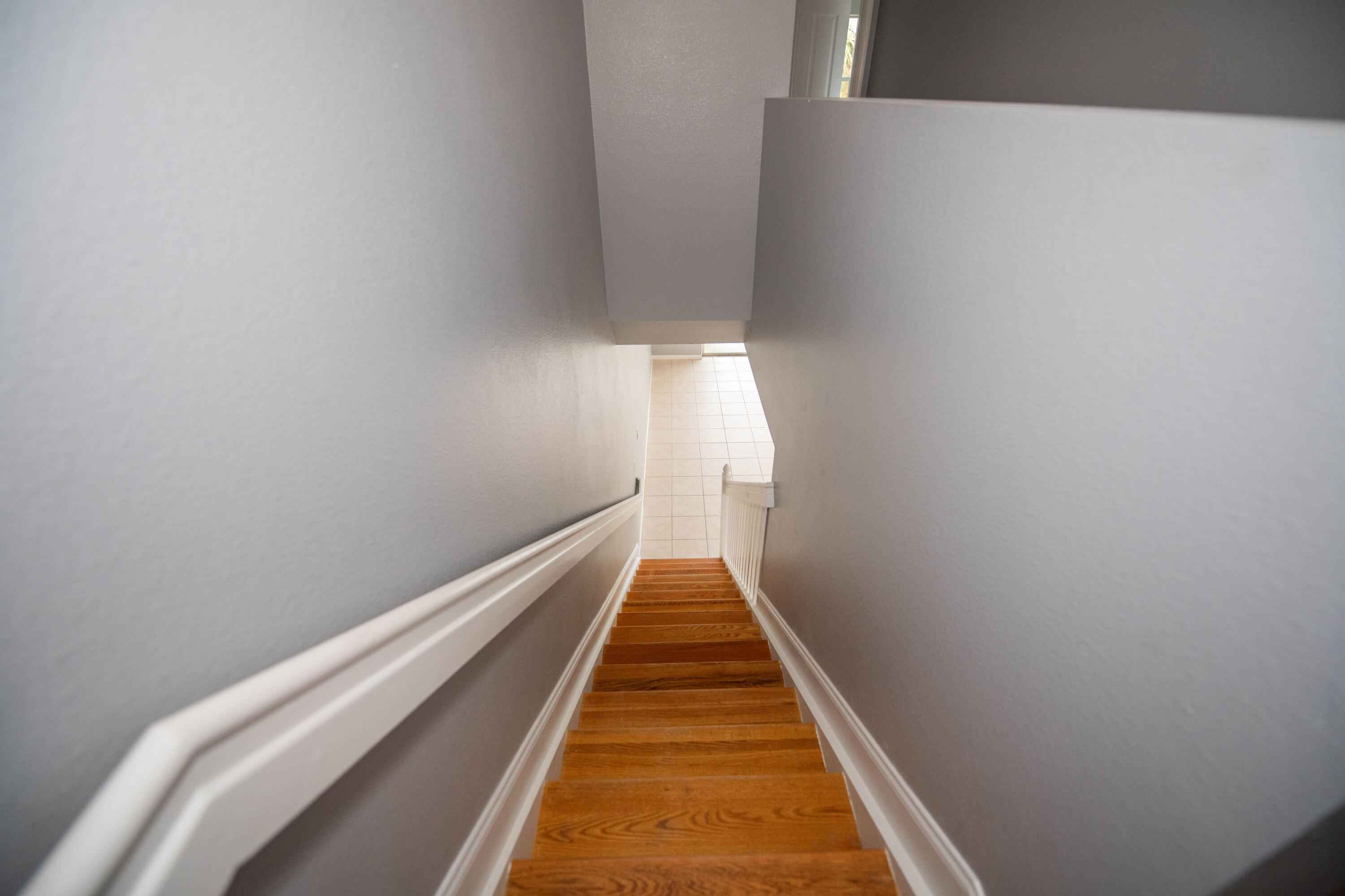 1101 Woodfield Road Greenacres, FL 33415 - Photo 10 of 24 Stairs leading upstairs