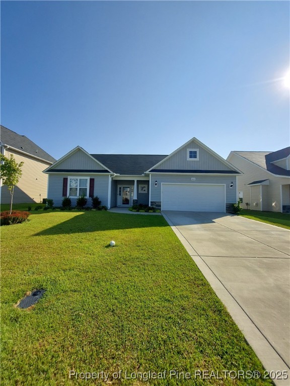 1641 Stackhouse Drive Fayetteville, NC 28314 - Photo 31 of 31 a front view of a house with a yard