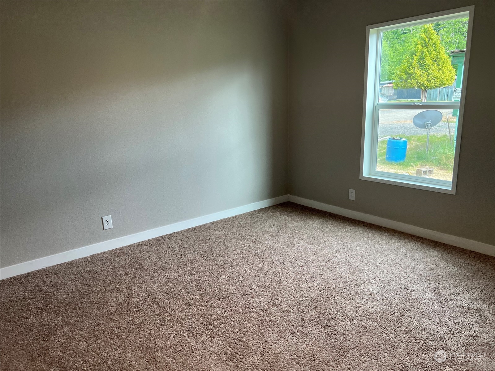 2610 Calawah Way, Unit 44 Forks, WA 98331 - Photo 12 of 12 an empty room with windows