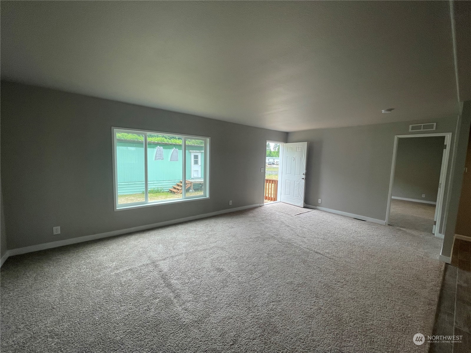 2610 Calawah Way, Unit 44 Forks, WA 98331 - Photo 2 of 12 an empty room with windows