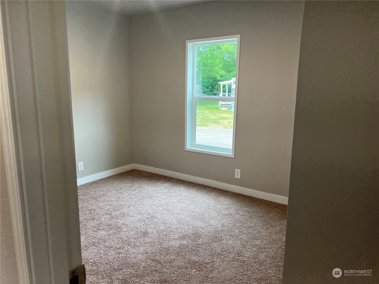 2610 Calawah Way, Unit 44 Forks, WA 98331 - Photo 10 of 12 an empty room with a window