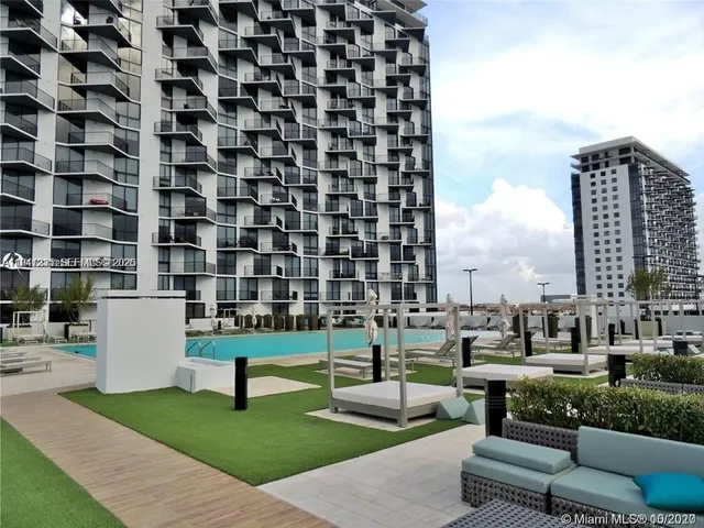 a view of a city with tall buildings