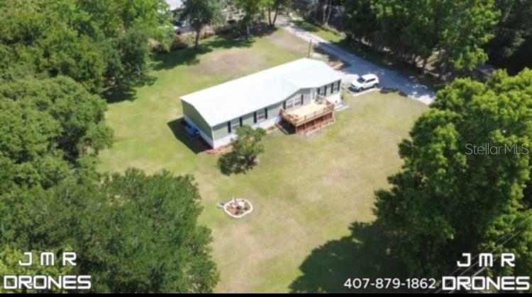 18137 Hollister Road Orlando, FL 32820 - Photo 24 of 27 a view of a lake