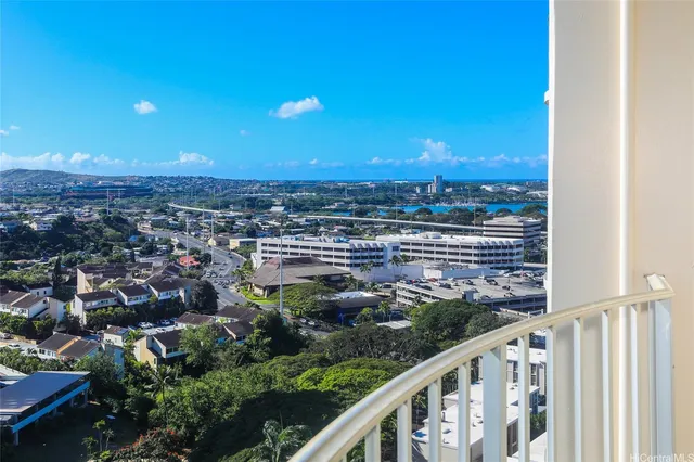 a view of balcony with wooden floor