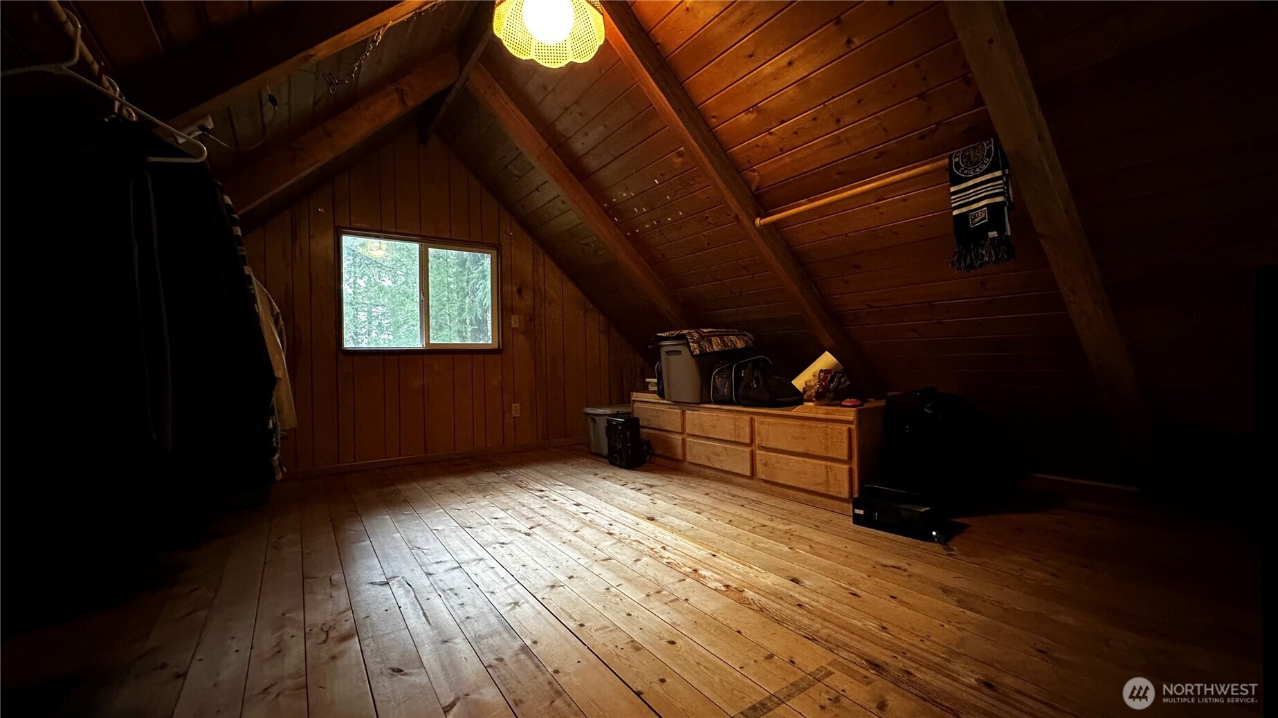 271 Salmon Street Brinnon, WA 98320 - Photo 7 of 17 a view of a room with wooden floor and a window