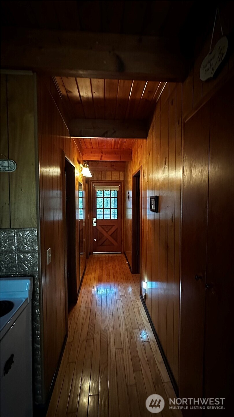 271 Salmon Street Brinnon, WA 98320 - Photo 9 of 17 a view of gallery with wooden floor