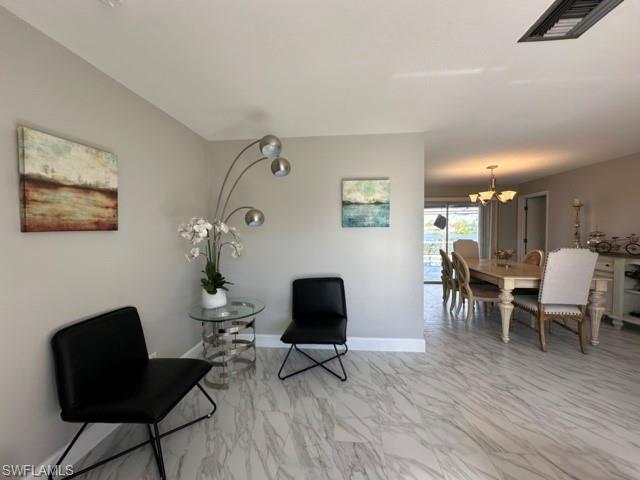 3065 50th Lane Southwest Naples, FL 34116 - Photo 13 of 21 a living room with furniture and wooden floor