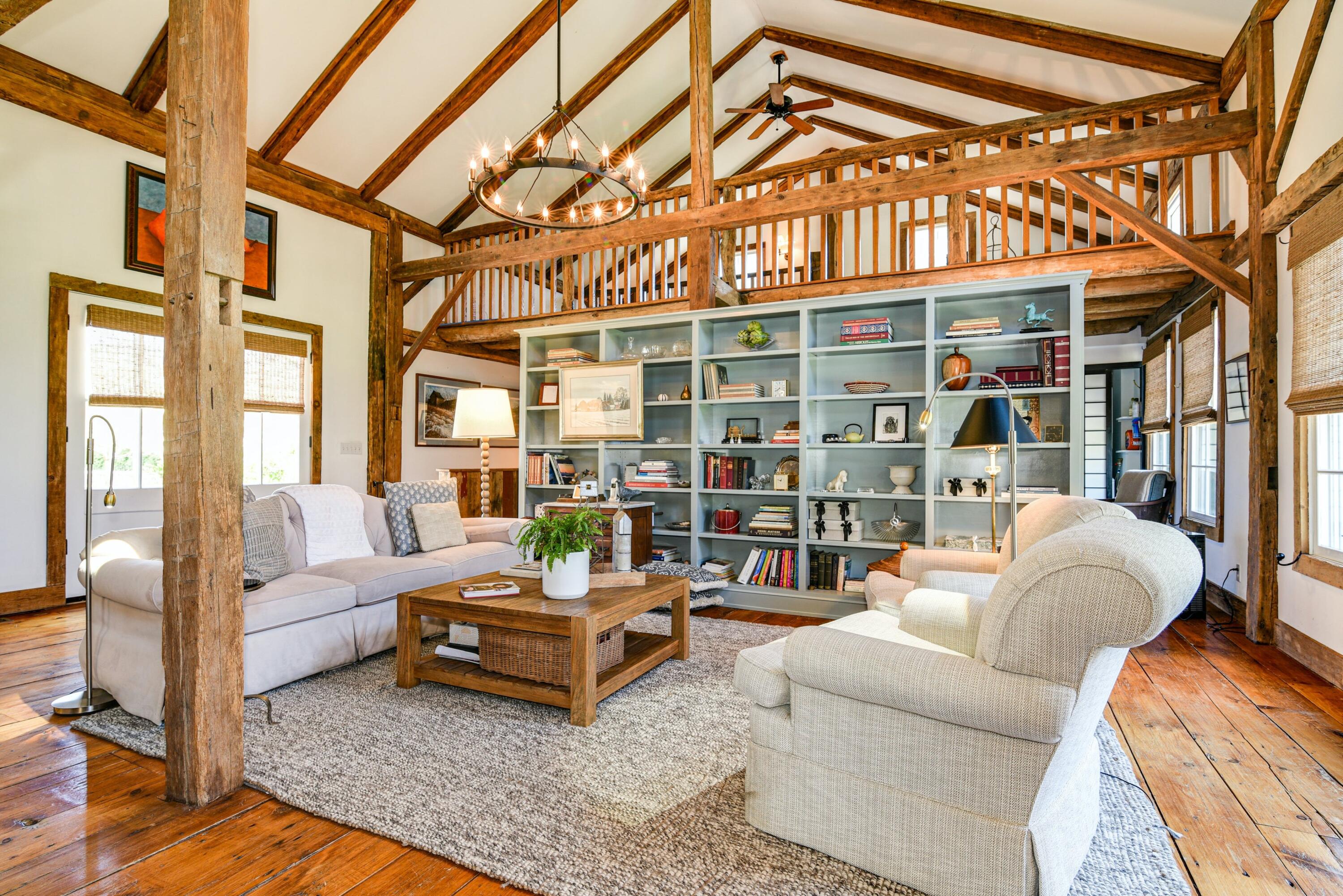 51 White Oak Shade Road New Canaan, CT 06840 - Photo 15 of 40 a living room with furniture and a large window