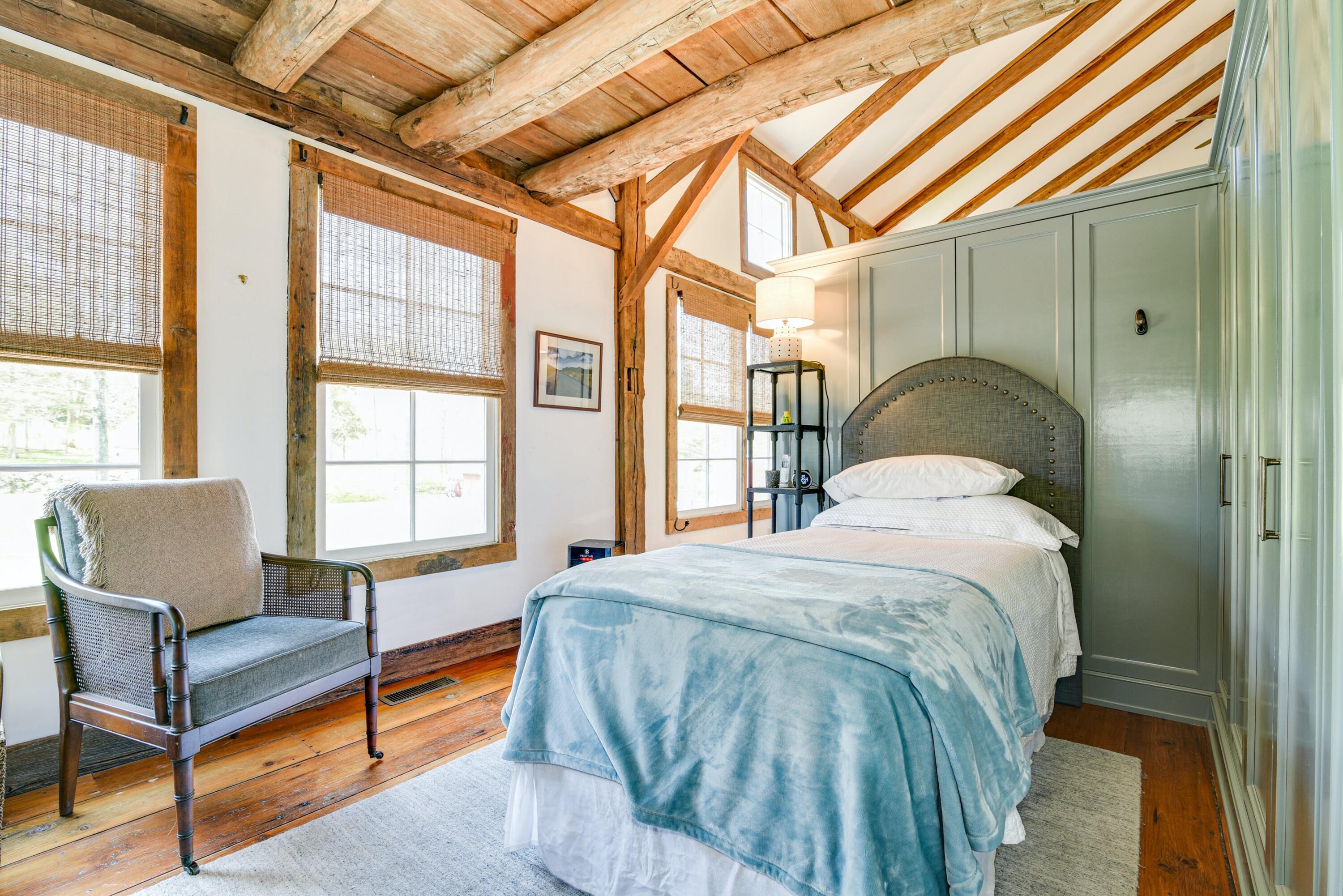 51 White Oak Shade Road New Canaan, CT 06840 - Photo 20 of 40 a bedroom with a bed and a window