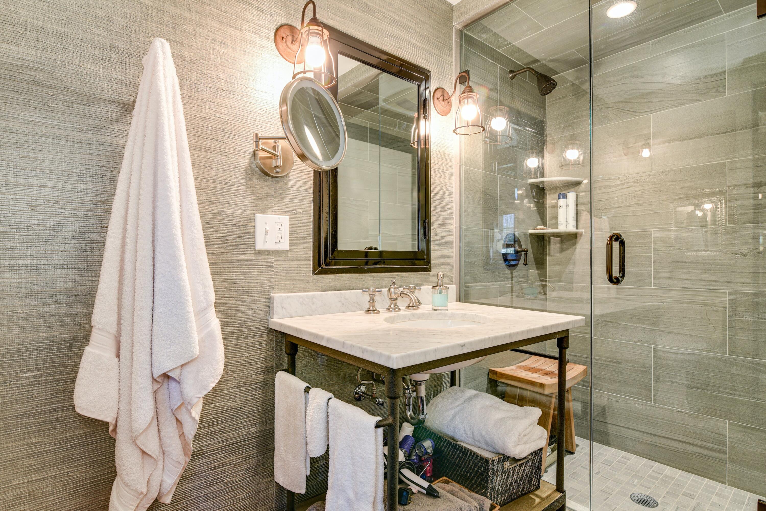 51 White Oak Shade Road New Canaan, CT 06840 - Photo 21 of 40 a bathroom with a sink and a mirror