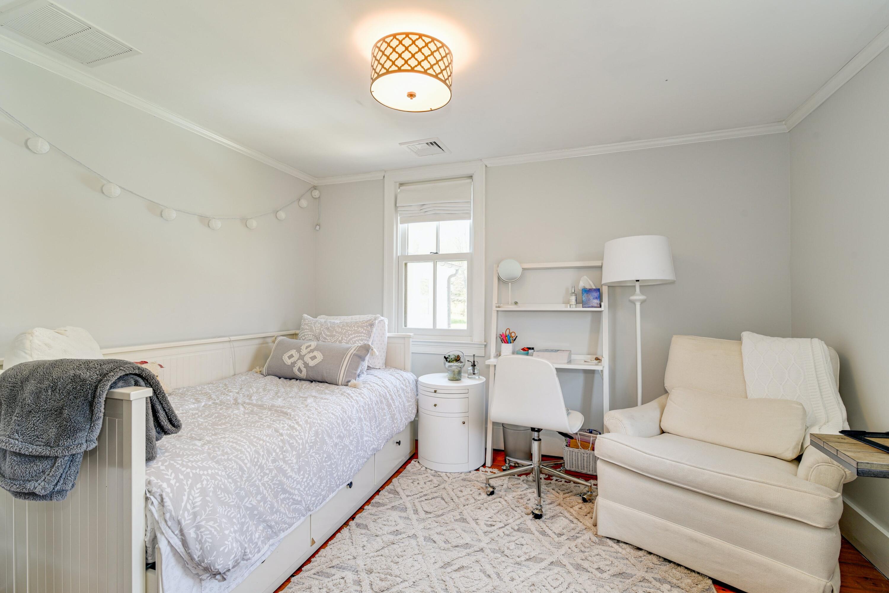 51 White Oak Shade Road New Canaan, CT 06840 - Photo 31 of 40 a bed room with a bed furniture and a window