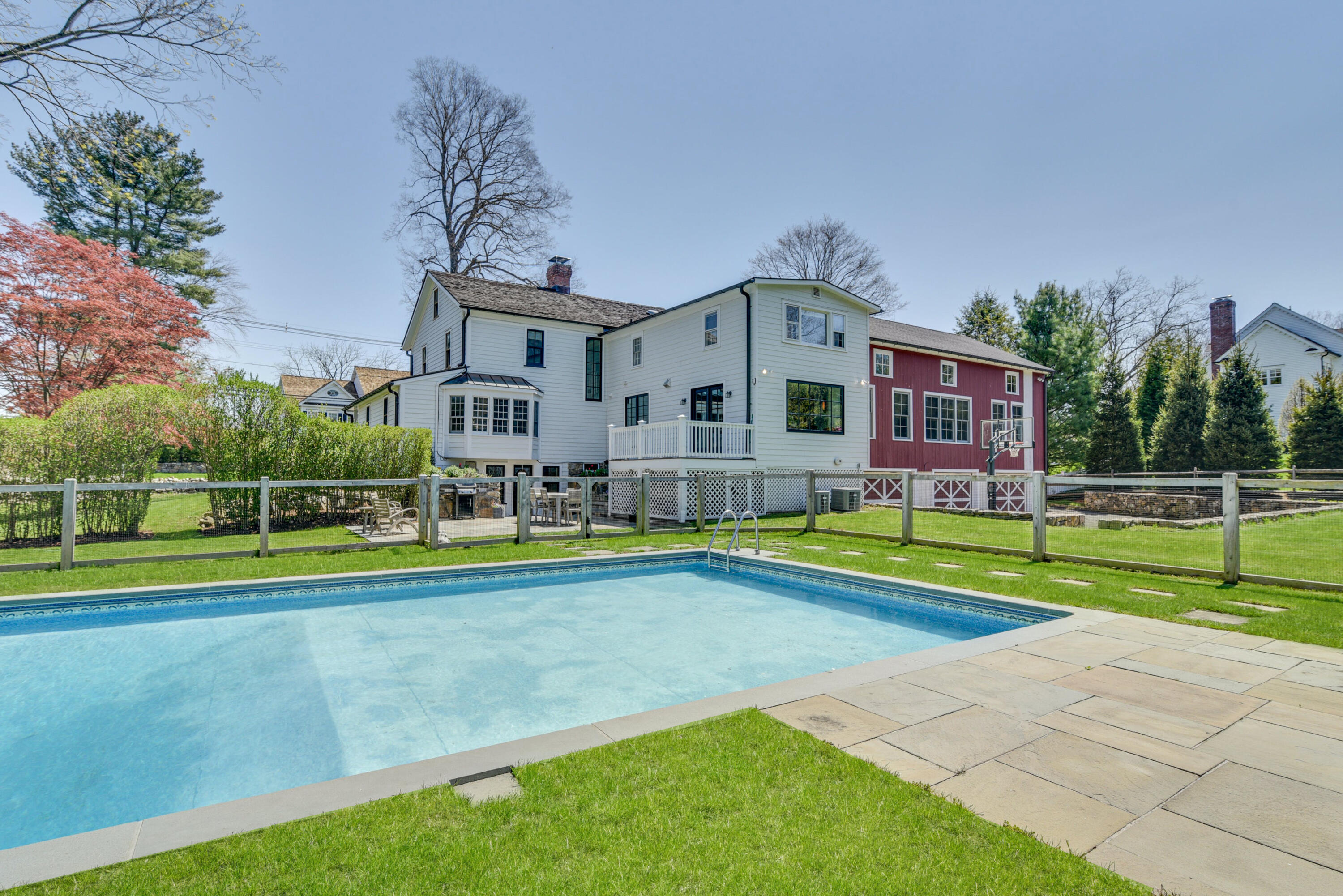 51 White Oak Shade Road New Canaan, CT 06840 - Photo 34 of 40 a view of pool with a big yard and large trees