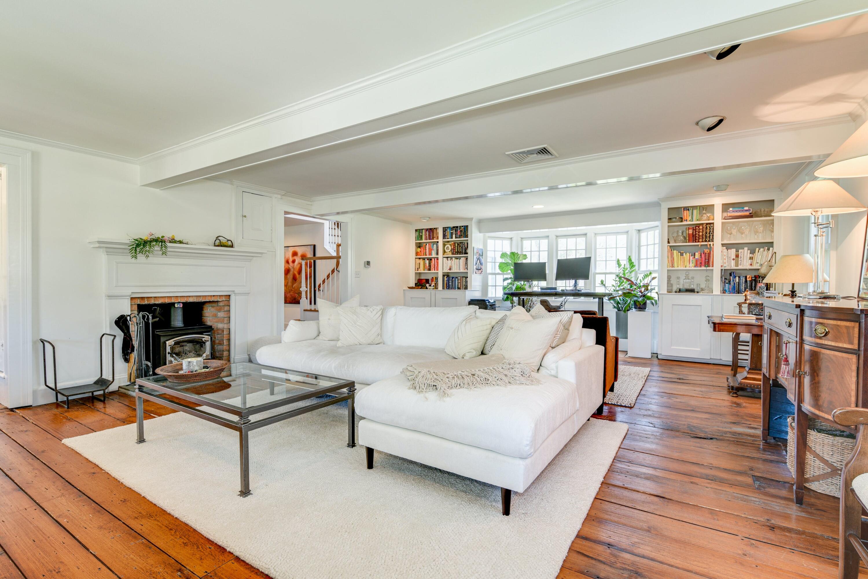 51 White Oak Shade Road New Canaan, CT 06840 - Photo 5 of 40 a living room with furniture and a fireplace