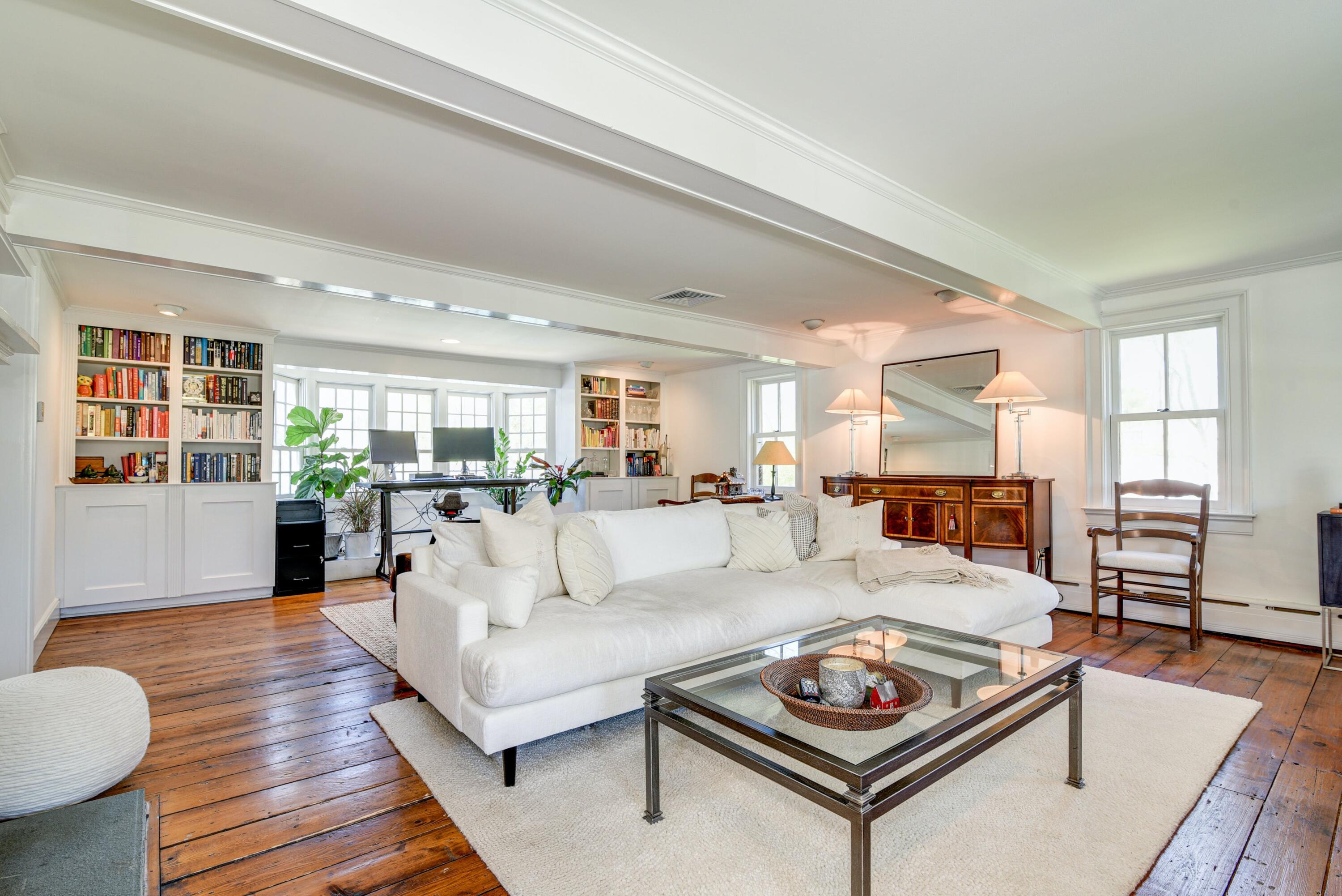 51 White Oak Shade Road New Canaan, CT 06840 - Photo 6 of 40 a living room with furniture a rug and a table