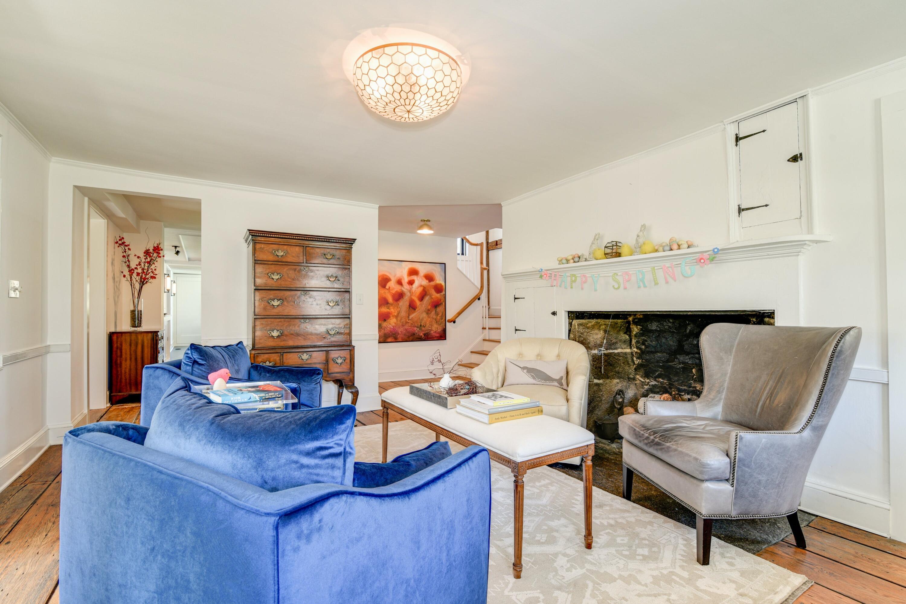 51 White Oak Shade Road New Canaan, CT 06840 - Photo 7 of 40 a work room with furniture wooden floor and a fireplace