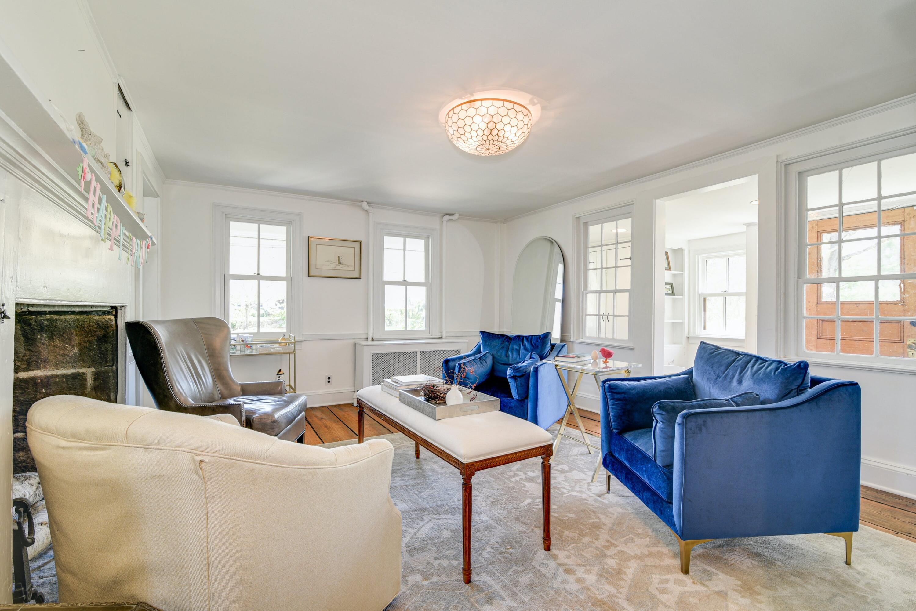 51 White Oak Shade Road New Canaan, CT 06840 - Photo 8 of 40 a living room with furniture and a large window
