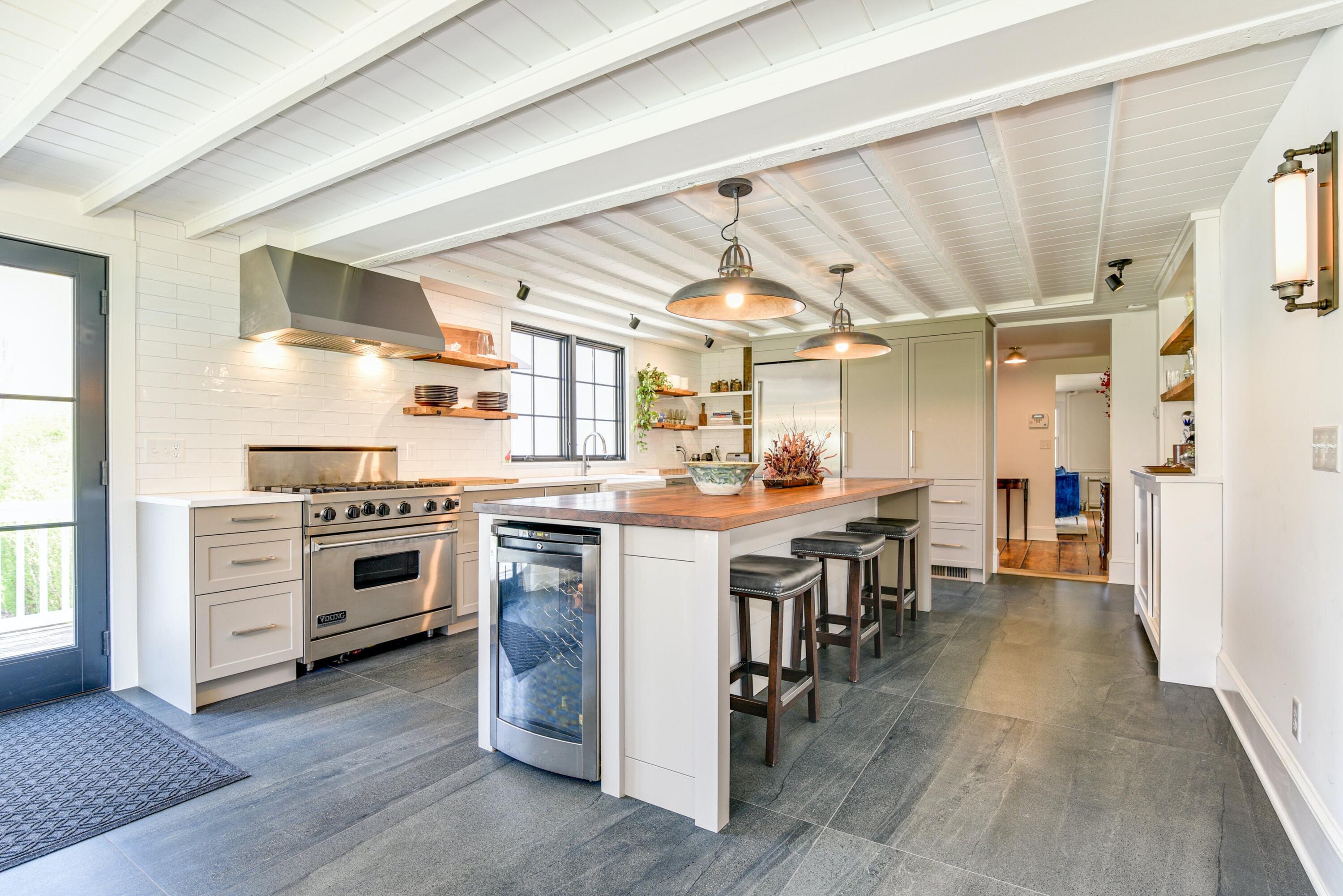 51 White Oak Shade Road New Canaan, CT 06840 - Photo 9 of 40 a kitchen with appliances a sink and cabinets