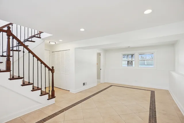 a view of an entryway with stairs