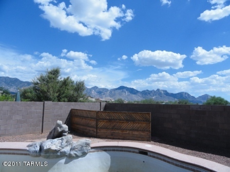3544 East Mecate Road Tucson, AZ 85739 - Photo 2 of 14 a view of house with outdoor space