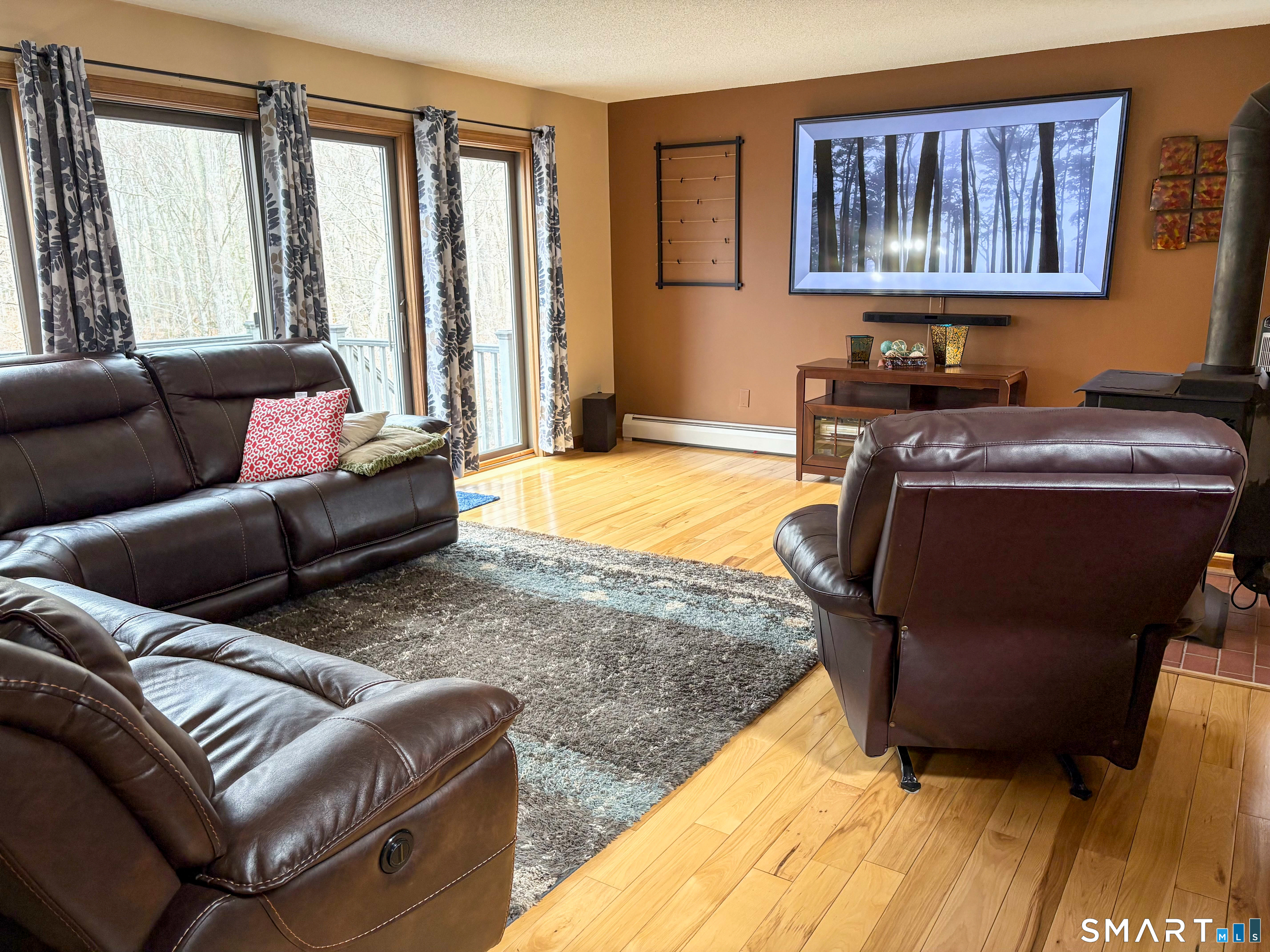 29 Whitney Road Columbia, CT 06237 - Photo 16 of 40 Family room with sliders to the large deck