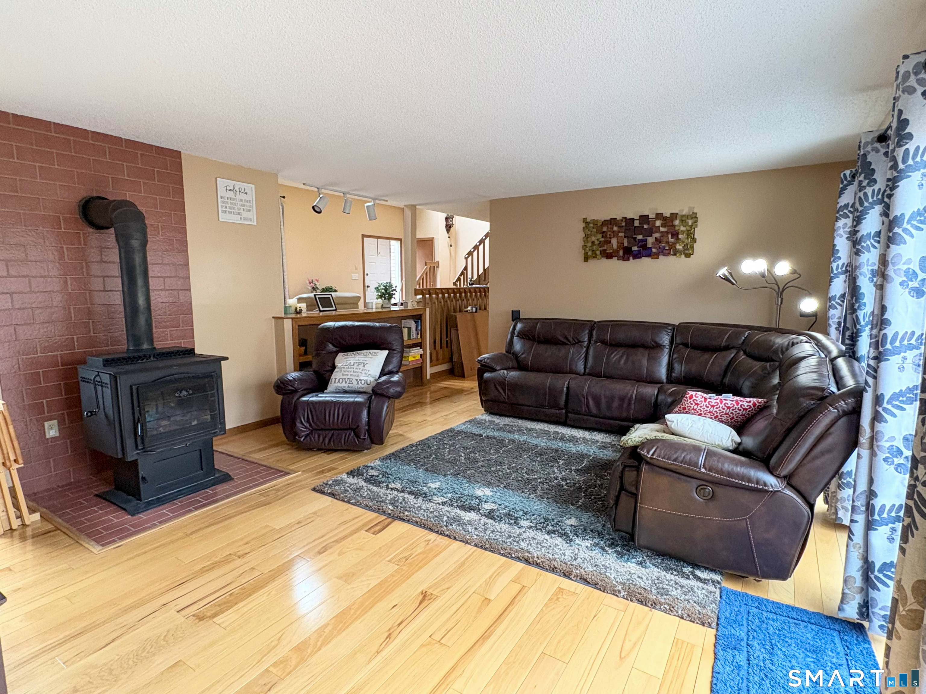 29 Whitney Road Columbia, CT 06237 - Photo 17 of 40 Family room (wood stove not included, however the piping will remain)